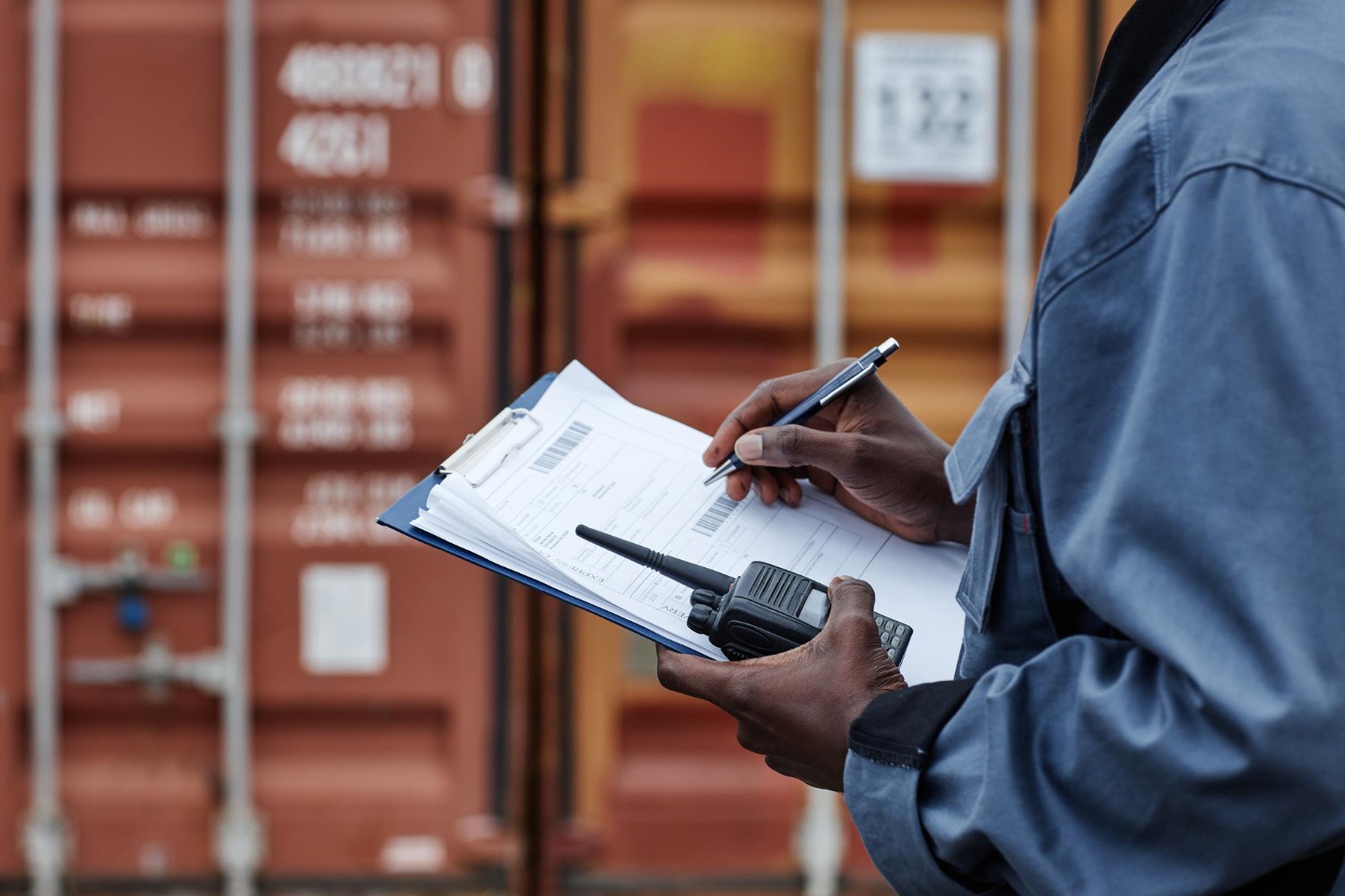 Illustration of a customs officer inspecting shipment documents