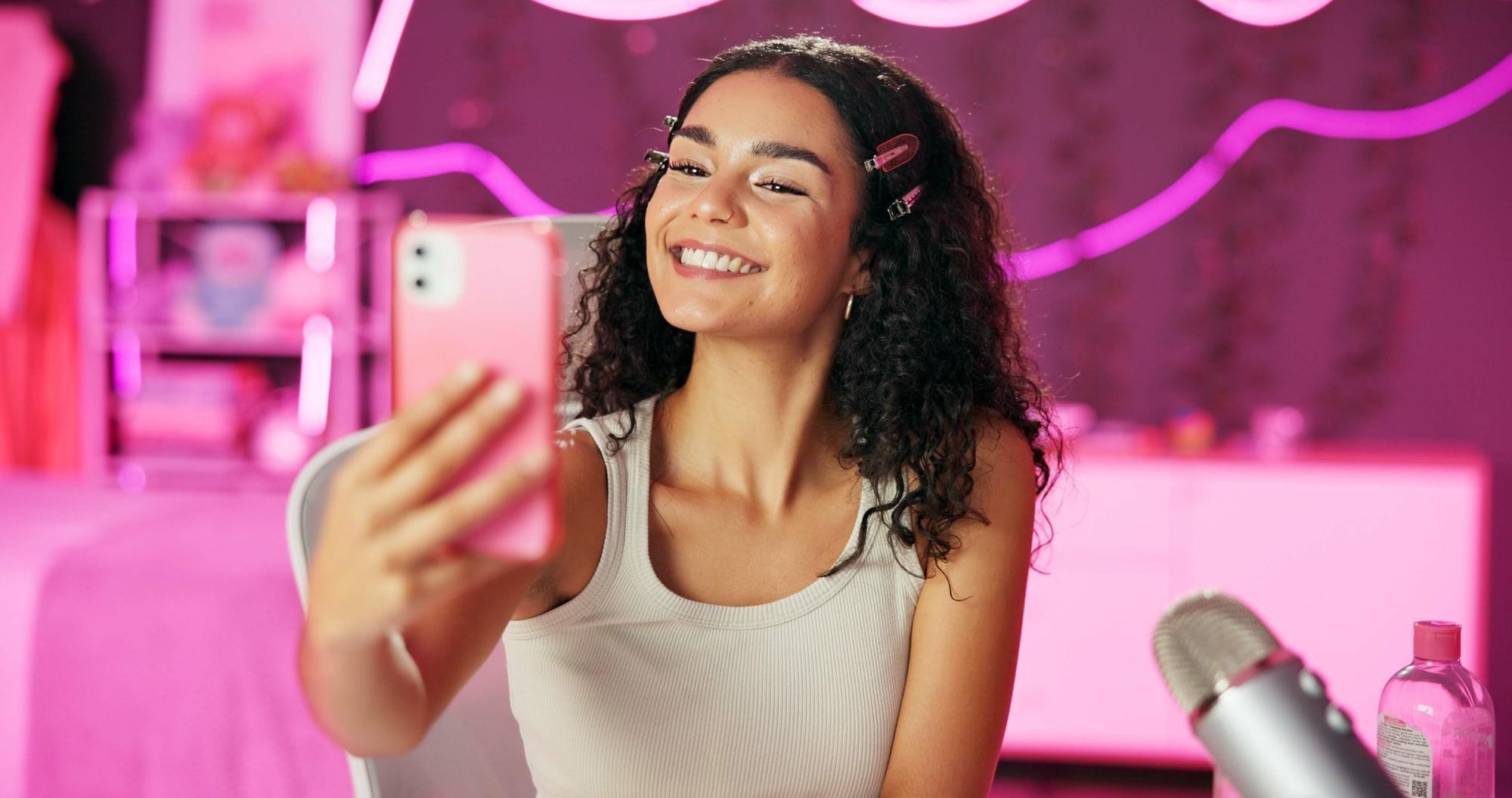Illustration of a social media influencer filming herself for a live stream video