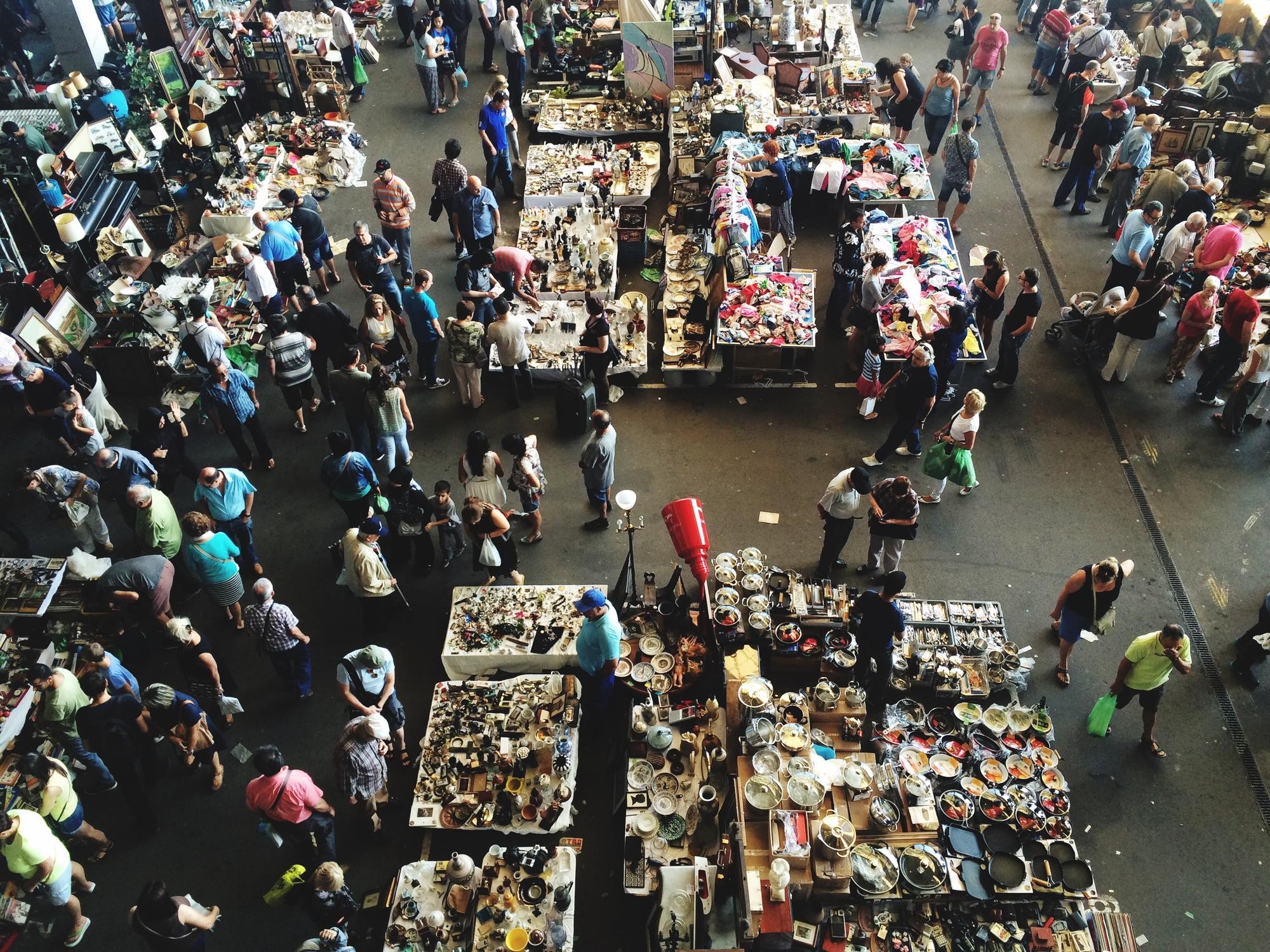 Illustration of a busy physical marketplace