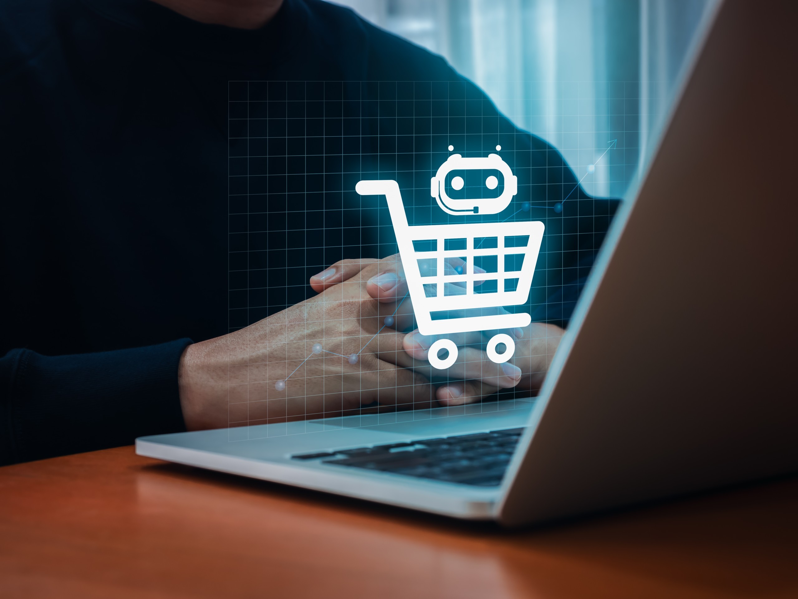 Illustration of the announced shopping feature of ChatGPT depicting a shopping cart with a chatbot icon hovering above a laptop