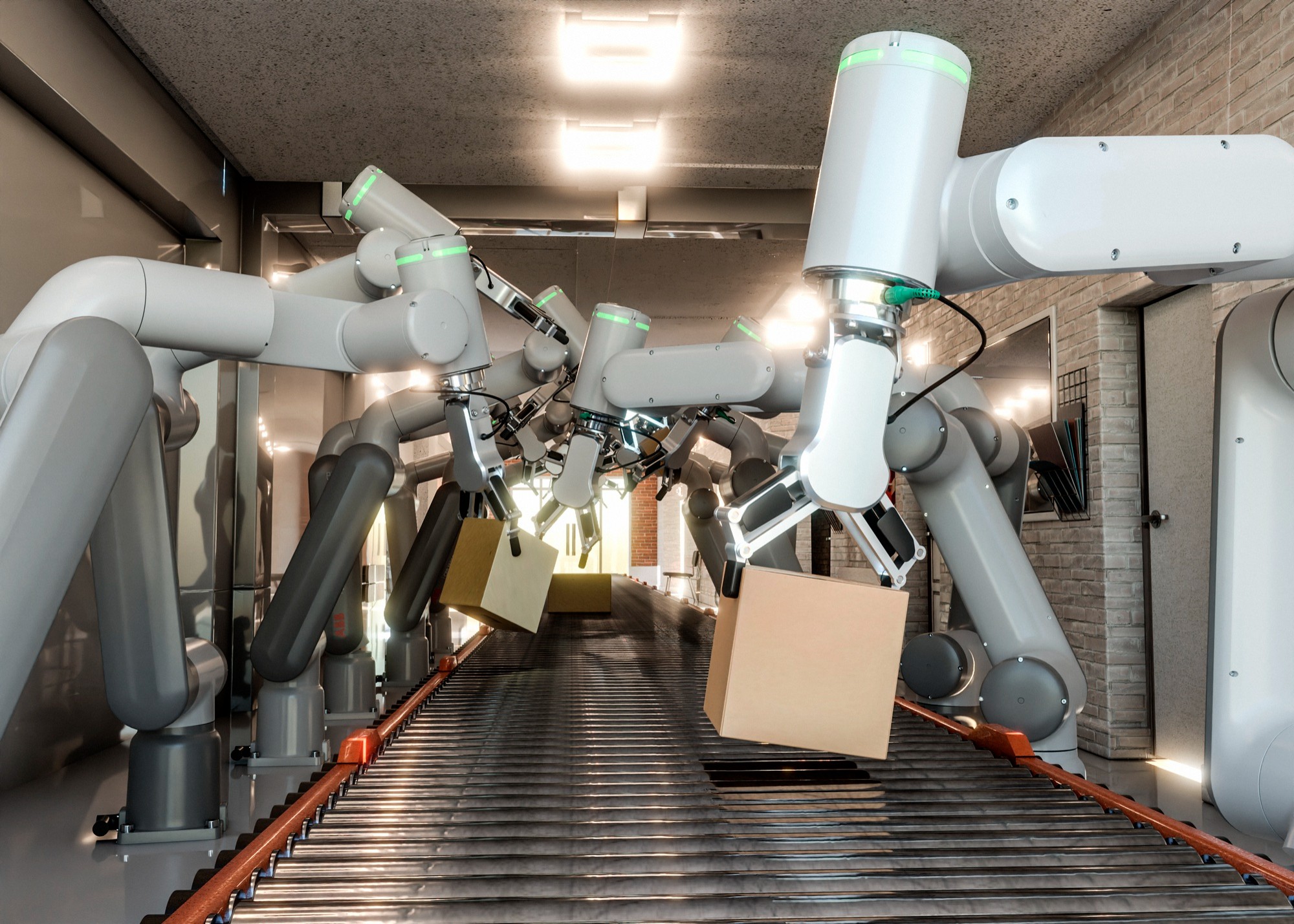 Stationary robots positioned beside an assembly line, picking up boxes