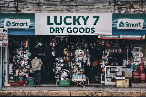 Image: Products presented in an untidy store with dirty shopfronts