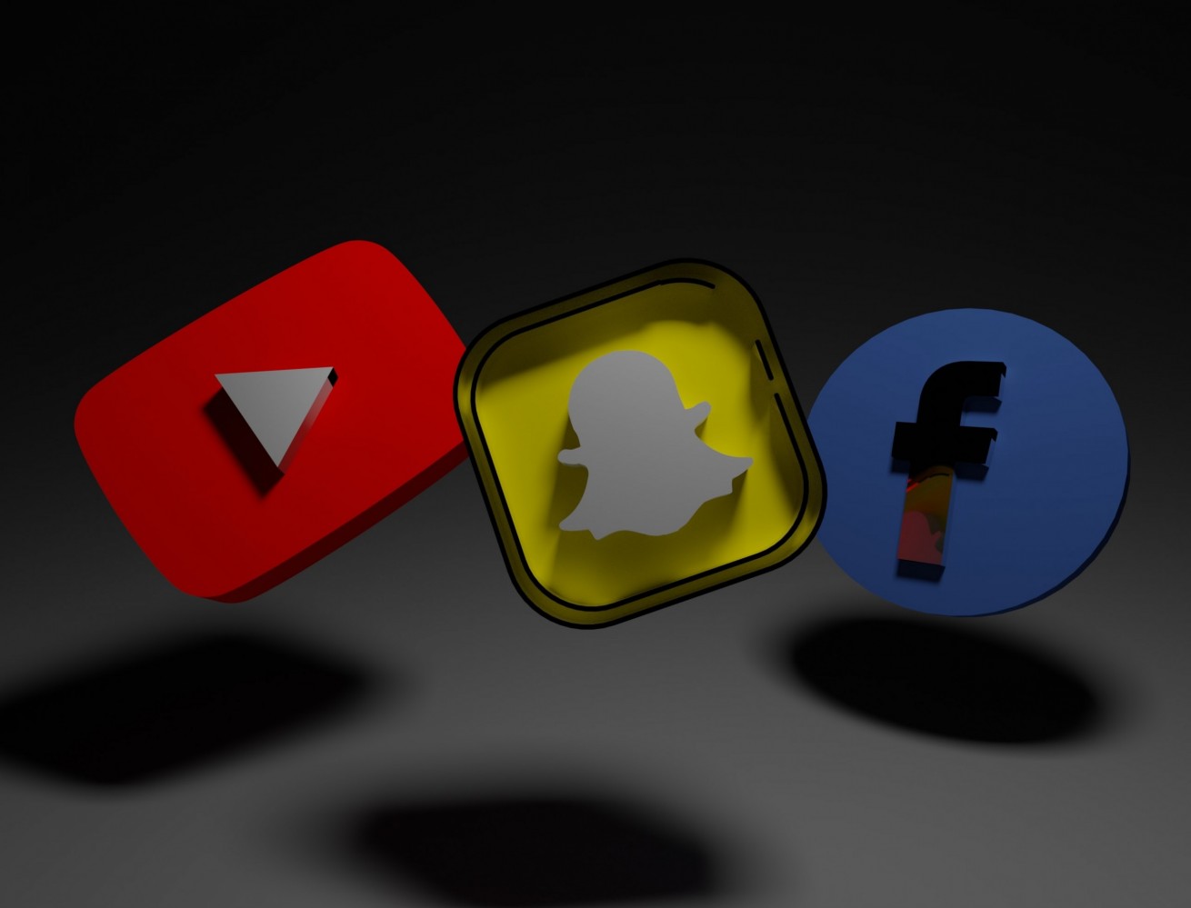 YouTube, Snapchat and Facebook logos side by side