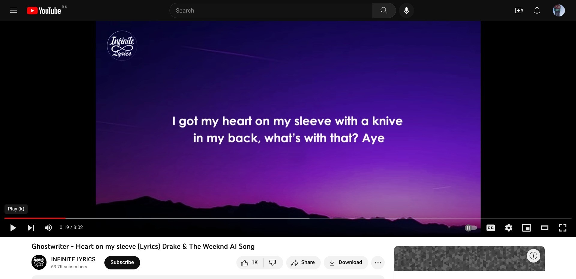 Screenshot of https://www.youtube.com/watch?v=81Kafnm0eKQ displaying a still image from the lyrics of Heart on my sleeve